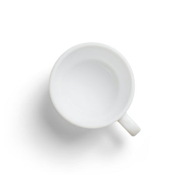 A plain white ceramic mug with a straight handle, photographed from directly above on a white background.